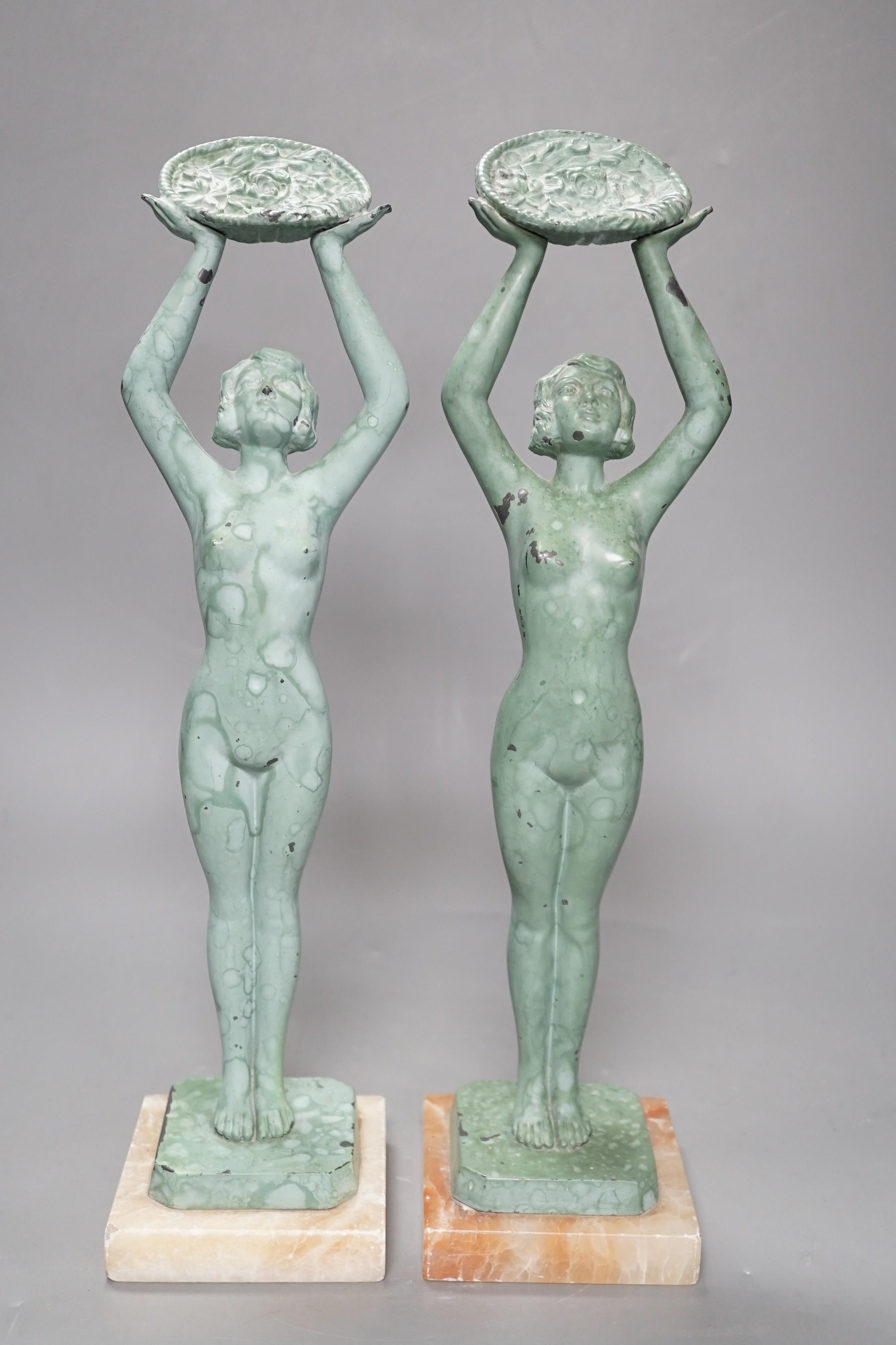 A pair of Art Deco bronzed metal figures stamped ‘Limousin’, 37cm
